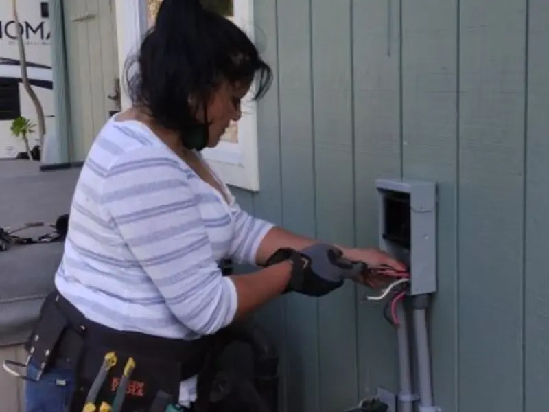Licensed electrician wiring an exterior subpanel in Winnfield