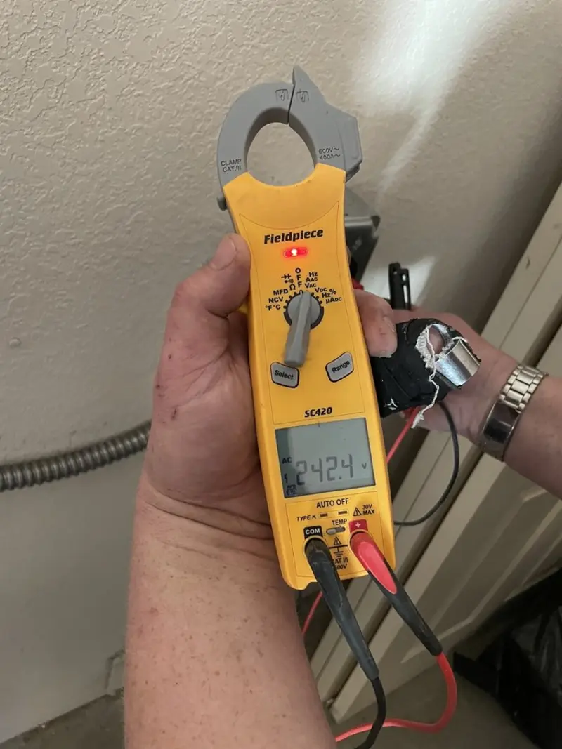 Voltage testing with clamp meter during Whole House Surge Protector in Winnfield